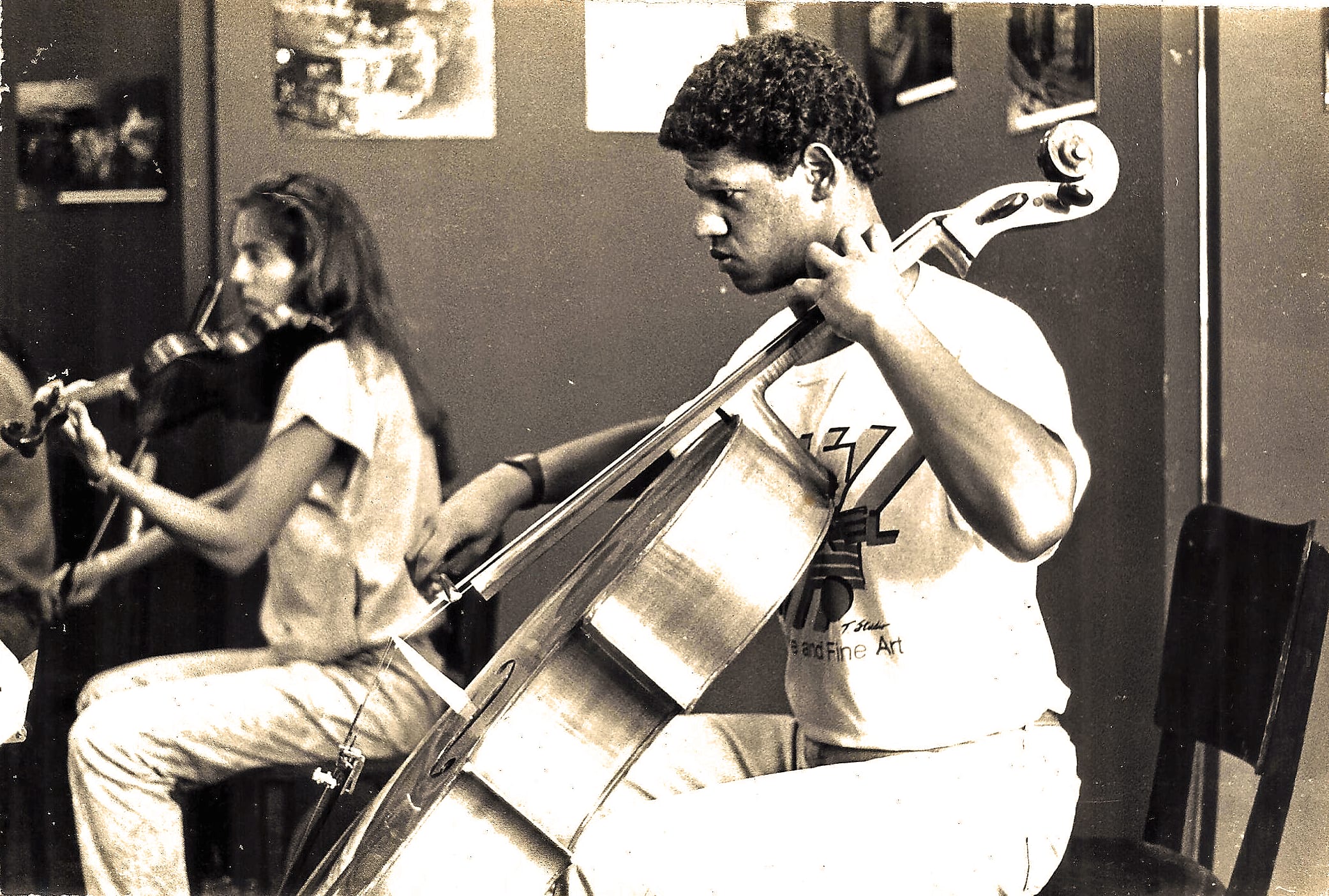 José Gallisa playing cello as a young student